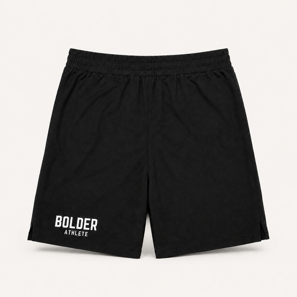 Black Bolder x Alpha Toro training shorts, rear view on light studio background